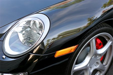 simsearch:400-04938994,k - Close up of headlight and fender of black German sports car Stock Photo - Budget Royalty-Free & Subscription, Code: 400-04512107