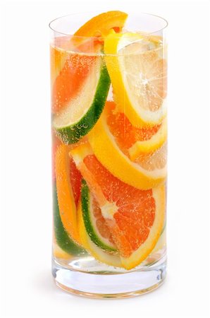 float lemon - Bubbly beverage with citrus slices isolated on white background Stock Photo - Budget Royalty-Free & Subscription, Code: 400-04512164