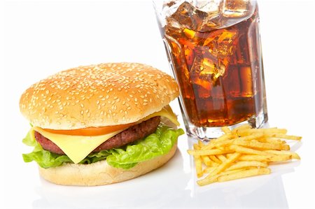 Cheeseburger, soda drink and french fries, reflected on white background. Shallow DOF Stock Photo - Budget Royalty-Free & Subscription, Code: 400-04512821