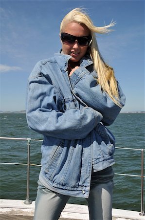 Beautiful blonde bundled up against the cold of a boat ride in San Francisco Bay Stock Photo - Budget Royalty-Free & Subscription, Code: 400-04513796