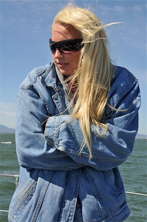 Beautiful blonde bundled up against the cold of a boat ride in San Francisco Bay Stock Photo - Budget Royalty-Free & Subscription, Code: 400-04513798