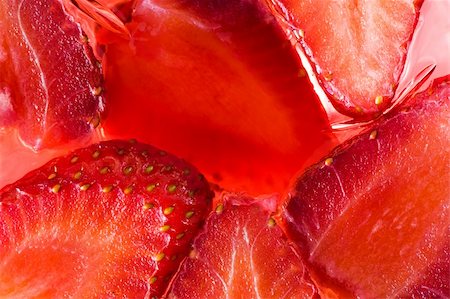 simsearch:400-04513818,k - Close-up picture of jelly containing real juicy strawberries Stock Photo - Budget Royalty-Free & Subscription, Code: 400-04513818