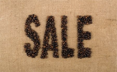 simsearch:400-06526962,k - The word SALE from coffee beans on linea material Foto de stock - Royalty-Free Super Valor e Assinatura, Número: 400-04524413