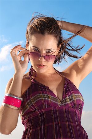 peeping fashion - Portrait of young fashion woman wearing sunglasses Stock Photo - Budget Royalty-Free & Subscription, Code: 400-04524450