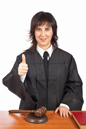 A female judge in a courtroom, success gesture. Shallow depth of field Photographie de stock - Aubaine LD & Abonnement, Code: 400-04524507