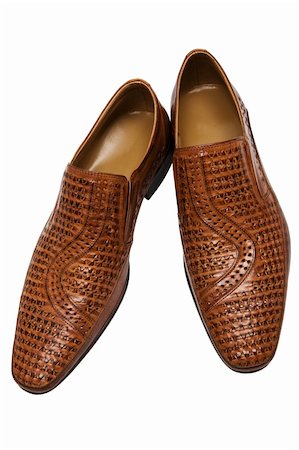 simsearch:400-05317494,k - Brown low shoes on a white background Photographie de stock - Aubaine LD & Abonnement, Code: 400-04526201