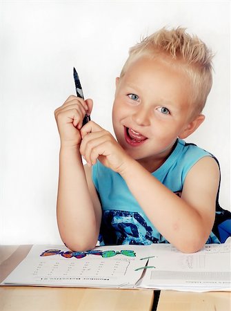 simsearch:400-05745952,k - Little boy doing math homework Stock Photo - Budget Royalty-Free & Subscription, Code: 400-04526258