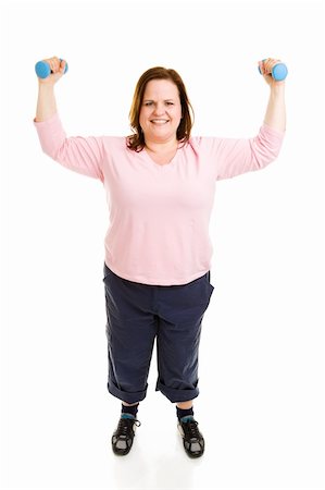 Beautiful plus-sized model working out with free weights.  Full body isolated on white. Stock Photo - Budget Royalty-Free & Subscription, Code: 400-04526286