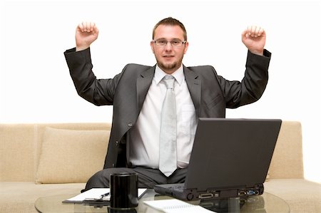 simsearch:400-04540351,k - happy man on sofa with laptop Stock Photo - Budget Royalty-Free & Subscription, Code: 400-04526367