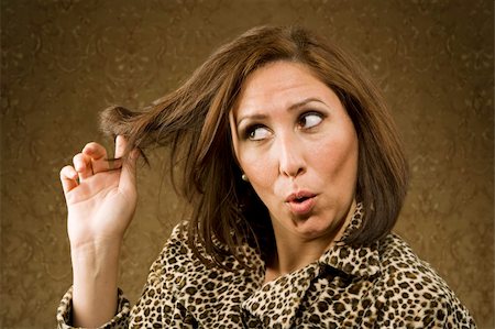 Hispanic Woman in Leopard Print Coat with Big Hair Stock Photo - Budget Royalty-Free & Subscription, Code: 400-04526668
