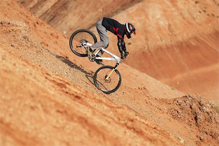 downhill mountain bike - Dangerous landing Stock Photo - Budget Royalty-Free & Subscription, Code: 400-04527056