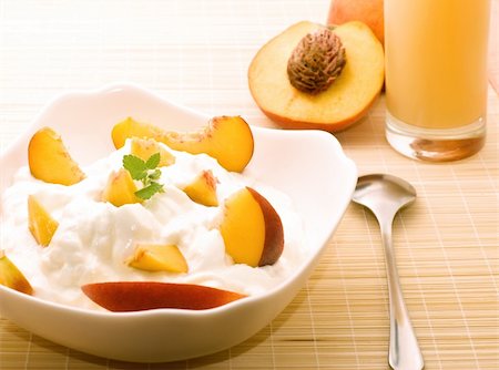 peach slice - Yogurt with fresh peaches and mint for healthy breakfast. Light toning. Stock Photo - Budget Royalty-Free & Subscription, Code: 400-04527067