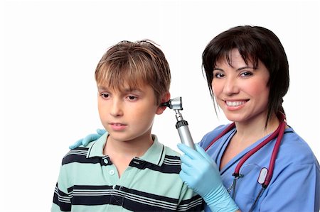 A doctor checks a boys ears with an otoscope (auroscope) Stock Photo - Budget Royalty-Free & Subscription, Code: 400-04527169