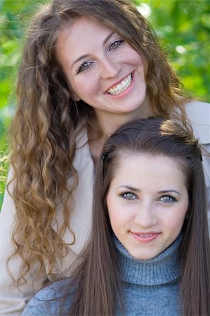 senior sisters happy two people - laughing girls in garden Stock Photo - Budget Royalty-Free & Subscription, Code: 400-04527305