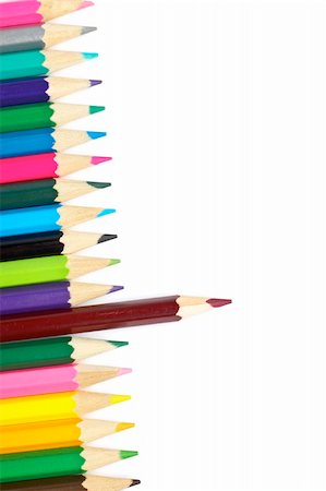 simsearch:400-03947012,k - Assortment of coloured pencils with shadow on white background. Shallow depth of field Stock Photo - Budget Royalty-Free & Subscription, Code: 400-04527347