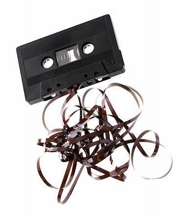 simsearch:400-07167932,k - Audio C cassette with tangled tape isolated on white Foto de stock - Super Valor sin royalties y Suscripción, Código: 400-04527723