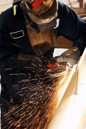 a picture of an arc welder at work Stock Photo - Budget Royalty-Free & Subscription, Code: 400-04527795