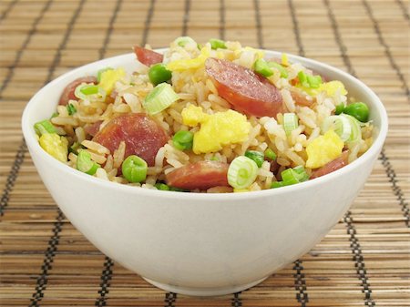 fried rice bowl - A bowl of fried rice with Chinese sausage, eggs, green peas, and green onions. Stock Photo - Budget Royalty-Free & Subscription, Code: 400-04528002