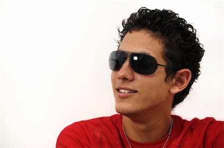 simsearch:400-04163139,k - Portrait of young man wearing sunglasses with attitude Photographie de stock - Aubaine LD & Abonnement, Code: 400-04528105