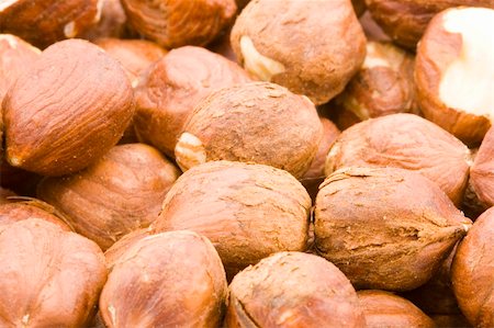 a lot of raw hazelnuts - close up Foto de stock - Royalty-Free Super Valor e Assinatura, Número: 400-04528505