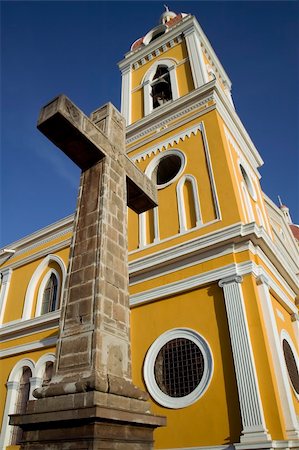 Stone cross next to the yellow cathedral in central Granada Nicaragua Stock Photo - Budget Royalty-Free & Subscription, Code: 400-04528915