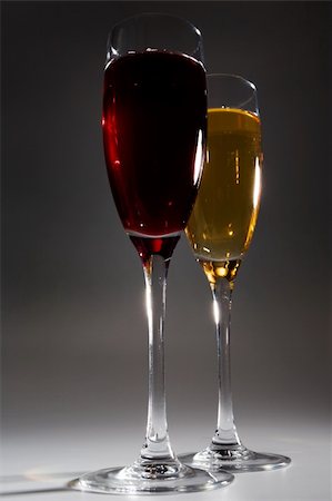 Two glasses with wine on a dark background Stock Photo - Budget Royalty-Free & Subscription, Code: 400-04529790