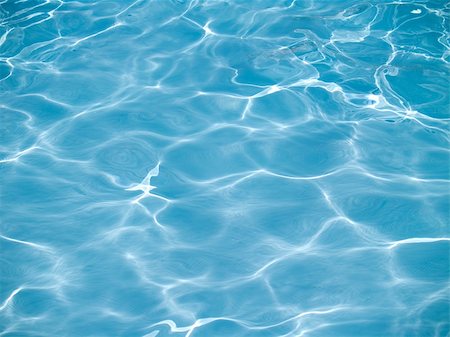 Sun reflections in pool water from above Stock Photo - Budget Royalty-Free & Subscription, Code: 400-04529870