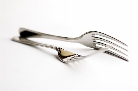 rosliothman (artist) - Pair of silver forks set on a white background - isolated Foto de stock - Super Valor sin royalties y Suscripción, Código: 400-04529919