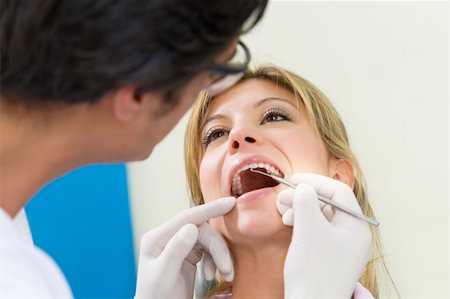 simsearch:400-04016093,k - young woman doing dental checkup Photographie de stock - Aubaine LD & Abonnement, Code: 400-04520454