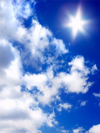 simsearch:400-05234387,k - sun and beautiful clouds on blue sky Fotografie stock - Microstock e Abbonamento, Codice: 400-04520563