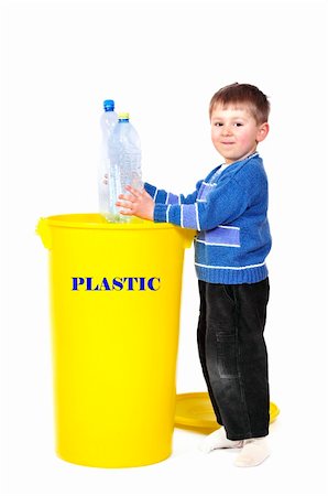 segregation - Young boy recycling plastic bottle Stock Photo - Budget Royalty-Free & Subscription, Code: 400-04521150