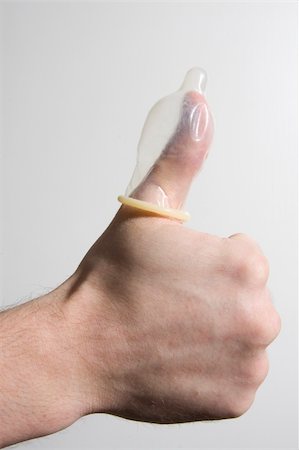 thumbs up, condom on thumb, Stock Photo - Budget Royalty-Free & Subscription, Code: 400-04521215