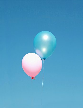 Pink and Blue Balloons Floating in the Blue Sky Stock Photo - Budget Royalty-Free & Subscription, Code: 400-04521545