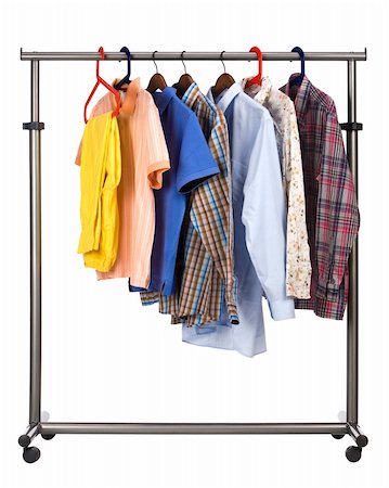 shirt on hanger - Seven multi-coloured shirts hang on a crossbeam Stock Photo - Budget Royalty-Free & Subscription, Code: 400-04521586