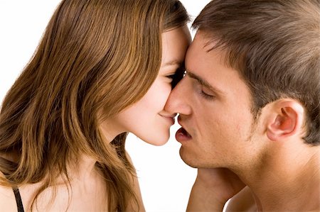 simsearch:400-04482792,k - Young adult couple in the studio kissing Stock Photo - Budget Royalty-Free & Subscription, Code: 400-04521659