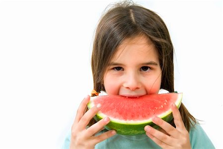simsearch:400-04979626,k - girl eating Watermelon isolated on white background Foto de stock - Super Valor sin royalties y Suscripción, Código: 400-04521671