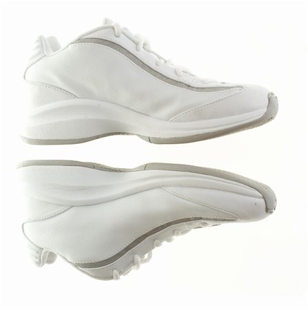 A pair of white basketball shoes isolated on a white background. Stockbilder - Microstock & Abonnement, Bildnummer: 400-04521969