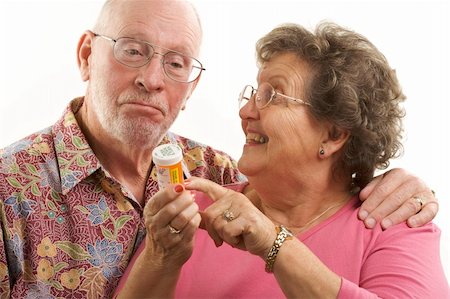 simsearch:400-04522125,k - Senior Couple reads a prescription bottle. Stock Photo - Budget Royalty-Free & Subscription, Code: 400-04522126