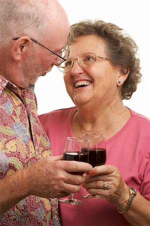 simsearch:400-04522125,k - Happy Senior Couple toasting with Wine glasses. Stock Photo - Budget Royalty-Free & Subscription, Code: 400-04522144