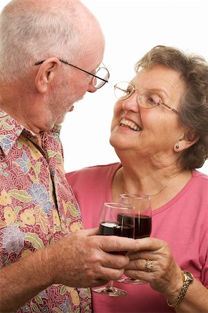 simsearch:400-04522125,k - Happy Senior Couple toasting with Wine glasses. Stock Photo - Budget Royalty-Free & Subscription, Code: 400-04522146