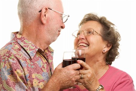 simsearch:400-04522125,k - Happy Senior Couple toasting with Wine glasses. Stock Photo - Budget Royalty-Free & Subscription, Code: 400-04522147