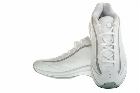 A pair of white basketball shoes isolated on a white background. Stockbilder - Microstock & Abonnement, Bildnummer: 400-04522242