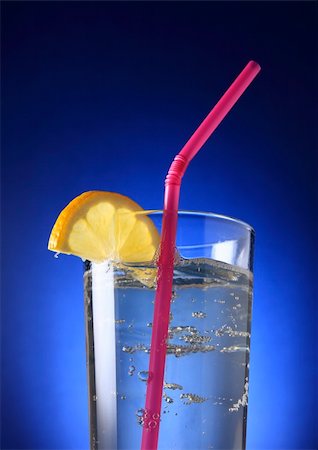 Alcohol cocktail with tonic and a slice of lemon. Stock Photo - Budget Royalty-Free & Subscription, Code: 400-04522626