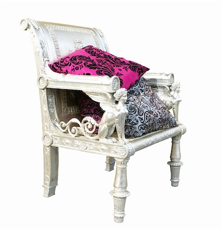Ornate carved armchair with cushions Isolated with clipping path Stock Photo - Budget Royalty-Free & Subscription, Code: 400-04522862