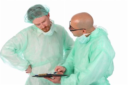 simsearch:6109-06005901,k - Details two surgeon with documents and pencil Fotografie stock - Microstock e Abbonamento, Codice: 400-04523067