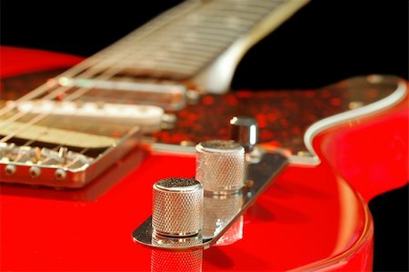 vintage red electric guitar close-up Stock Photo - Budget Royalty-Free & Subscription, Code: 400-04523928