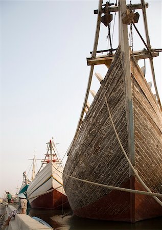 simsearch:400-04484889,k - Makassar schooners (pinisi) in Sunda Kelapa, the old port of Jakarta, Indonesia Stock Photo - Budget Royalty-Free & Subscription, Code: 400-04534047