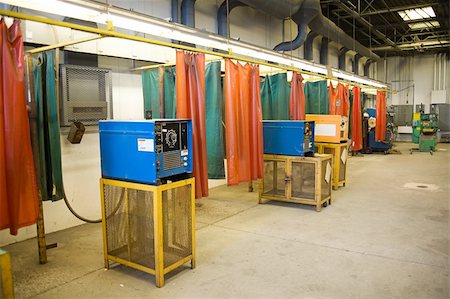 Wide angle view of the metal workshop area of a technical trade school, with welding torch machines at the work stations. Stock Photo - Budget Royalty-Free & Subscription, Code: 400-04534360