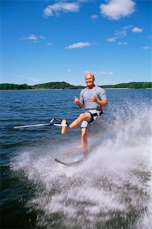 pulled - A young man water skiing Stock Photo - Budget Royalty-Free & Subscription, Code: 400-04536330