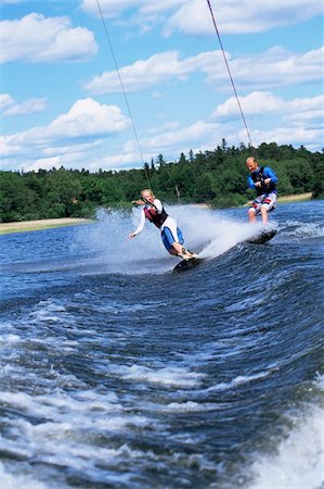 A man and woman water-skiing Stock Photo - Budget Royalty-Free & Subscription, Code: 400-04536331